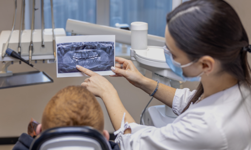 Patient experiencing jaw pain from teeth grinding