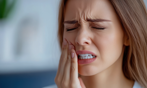 Dentist evaluating bite alignment for bruxism treatment