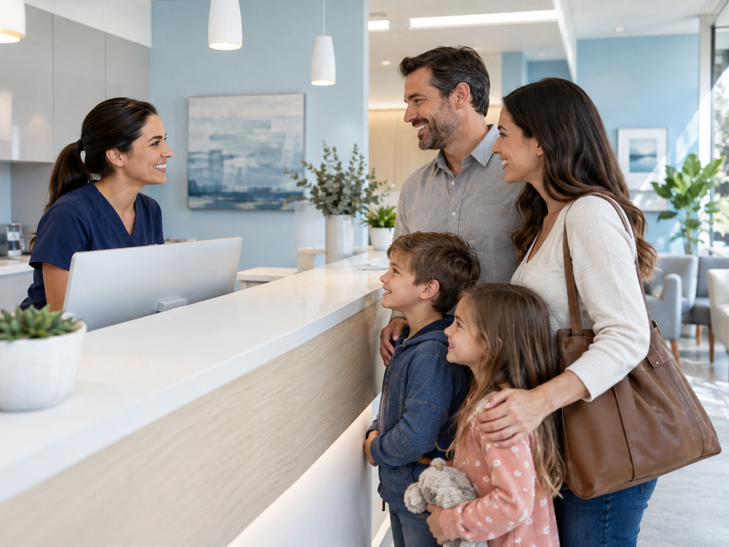 Avon Lake family greeted at the front desk of Westlake Dental Associates